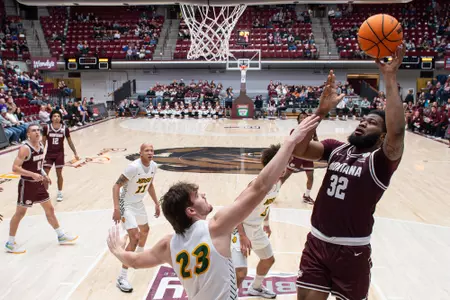 Te'Jon Sawyer #32 of the Montana Grizzlies shoots during the second half against the North Dakota State Bison at Dahlberg Arena on November 16, 2023 in Missoula, Montana