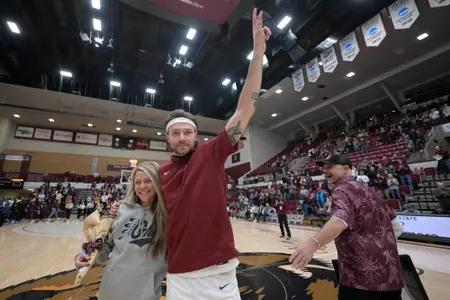 Mack Anderson #23 of the Montana Grizzlies gets honored prior to a game against the Sacramento State Hornets for senior night at Robin Selvig Court on February 25, 2023 in Missoula, Montana.