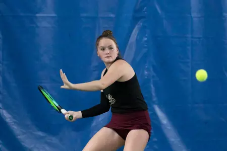 Grace Haugen prepares to hit the ball against the Idaho Vandals on March 23, 2023 at PEAK Fitness. The Grizzlies beat the Vandals 5-2.