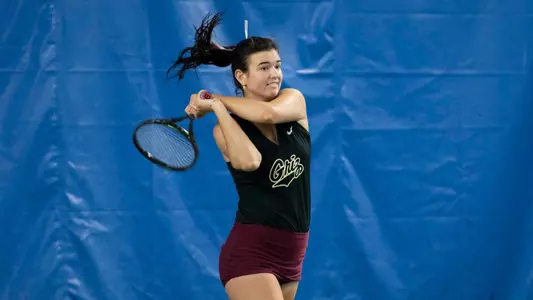 Lauren Dunlap hits the ball against the Idaho Vandals on March 23, 2023 at PEAK Fitness. The Grizzlies beat the Vandals 5-2.