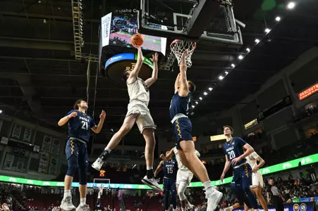 Josh Bannan #13 of the Montana Grizzlies shoots in the paint during a game against the Northern Arizona Lumberjacks in the semifinals of the Big Sky Basketball Tournament on March 6, 2023 in Boise, Idaho.