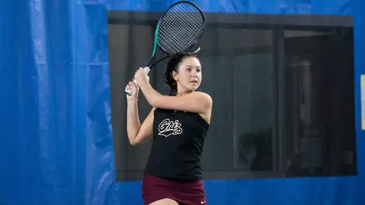 Hailey Murphy watches the ball against the Idaho Vandals on March 23, 2023 at PEAK Fitness. The Grizzlies beat the Vandals 5-2.