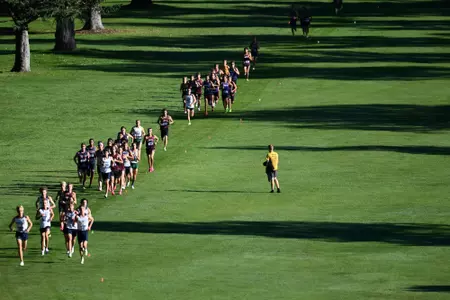 Griz Cross Country races during a cross country meet at the University of Montana Golf Course in Missoula, Montana on Friday, Sept. 15, 2023.