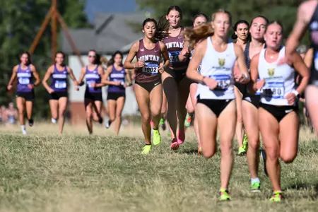 Griz Cross Country races during a cross country meet at the University of Montana Golf Course in Missoula, Montana on Friday, Sept. 15, 2023.