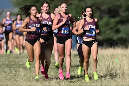 Griz Cross Country races during a cross country meet at the University of Montana Golf Course in Missoula, Montana on Friday, Sept. 15, 2023.