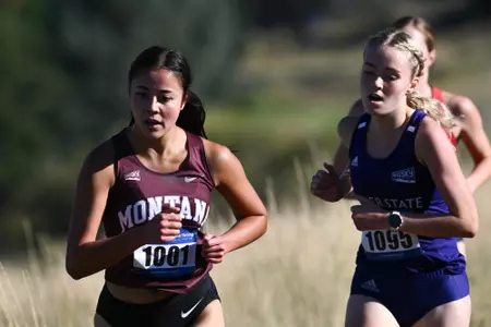 Griz Cross Country races during a cross country meet at the University of Montana Golf Course in Missoula, Montana on Friday, Sept. 15, 2023.