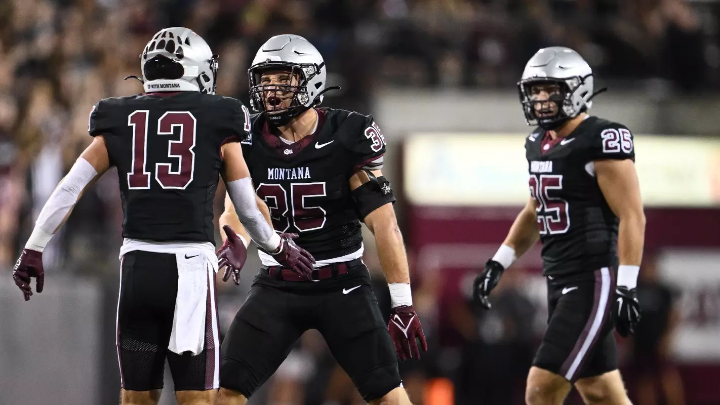 MISSOULA, MONTANA - SEPTEMBER 16: Montana Grizzlies linebacker Braxton Hill #35 celebrates after making a play against the Ferris State Bulldogs at Washington-Grizzly Stadium on September 16, 2023 in Missoula, Montana.