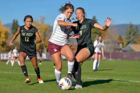 Riley O’Brien #10 of the Montana Grizzlies battles for the ball during the first half of a college soccer match between the Montana Grizzlies and the Sacramento State Hornets at South Campus Stadium on October 19, 2023 in Missoula, Montana.