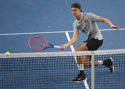 Tom Bittner hits the ball during a tennis match between the Montana Grizzlies and the Whitworth Pirates at the Peak Racquet Club in Missoula, Montana on January 20, 2024.