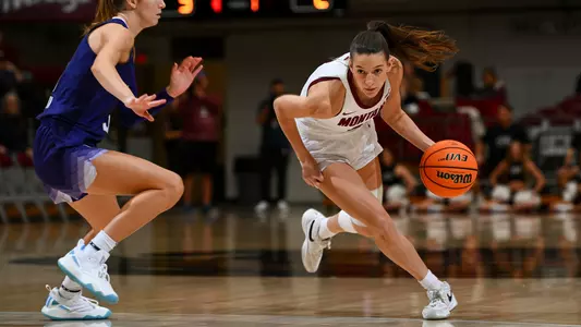 Mack Konig #2 of the Montana Grizzlies drives the ball to the basket during the first half against Washington at Dahlberg Arena on Sunday, Nov. 17, 2024, in Missoula, Montana.