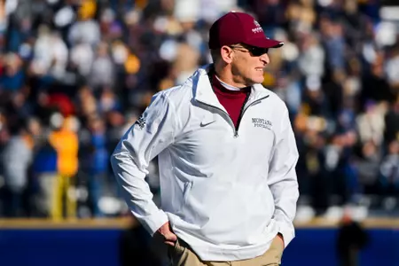 Head coach Bobby Hauck of the Montana Grizzlies stands before a game at Bobcat Stadium on November 23, 2024 in Bozeman, Montana.