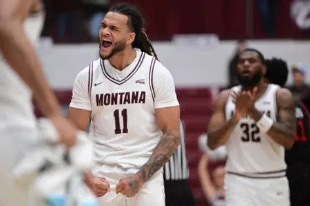 Joe Pridgen #11 of the Montana Grizzlies reacts during the second half at Dahlberg Arena on November 27, 20242 in Missoula, Montana.
