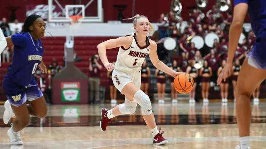 Macy Donarski #1 of the Montana Grizzlies dribbles the ball towards the basket during the second half against Washington at Dahlberg Arena on Sunday, Nov. 17, 2024, in Missoula, Montana.