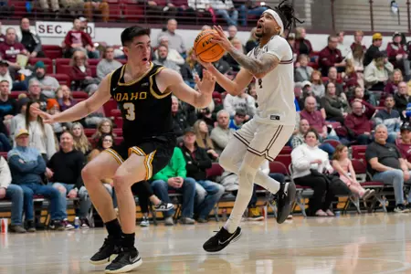 Giordan Williams #4 of the Montana Grizzlies shoots the ball during the first half of game against the Idaho Vandals at Robin Selvig Court inside Dahlberg Arena on February 1, 2024 in Missoula, Montana.