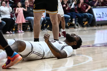 Te'Jon Sawyer #32 of the Montana Grizzlies reacts after getting fouled during the first half against the Idaho Vandals at Robin Selvig Court inside Dahlberg Arena on February 1, 2024 in Missoula, Montana.