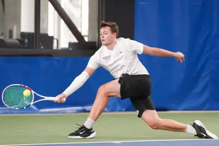 Moritz Stoeger of The Montana Grizzlies hits the ball during a match against the Whitman Blues on Feb. 10, 2024 at the PEAK Racquet Club in Missoula, Montana.