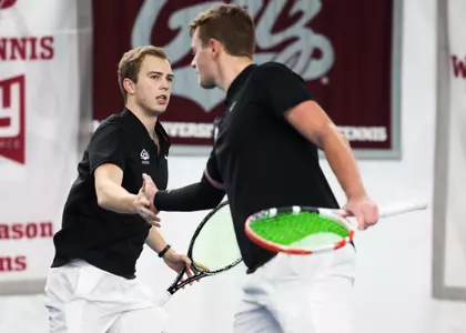Baltazar Wiger-Nordas and Moritz Stoeger celebrate after a play against the Western Washington Eagles at PEAK Racquet Club on February 1, 2024, in Missoula, Montana.