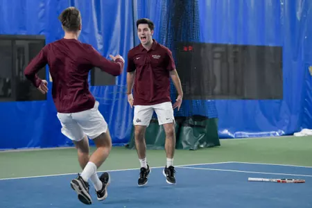 Fernando Perez of the Montana Grizzlies celebrates after winning a singles match during a tennis match against the Grand Canyon Lopes at PEAK Racquet Club on February 4, 2024 in Missoula, Montana.