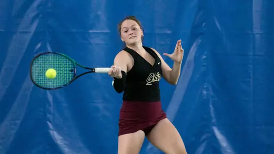 Grace Haugen hits the ball against the Idaho Vandals on March 23, 2023 at PEAK Fitness. The Grizzlies beat the Vandals 5-2.