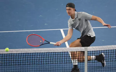 Tom Bittner hits the ball during a tennis match between the Montana Grizzlies and the Whitworth Pirates at the Peak Racquet Club in Missoula, Montana on January 20, 2024.