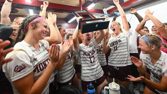 The Montana Grizzlies celebrate their win over Sacramento State to clinch the Big Sky Conference at the South Campus Stadium on Thursday, Oct. 19, 2023.