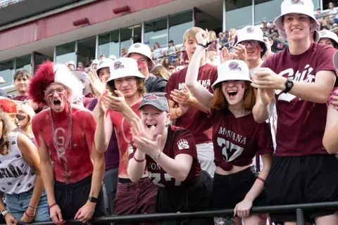 The student section celebrates after the Griz score against Buttler at Washington-Grizzly Stadium on Saturday, Sept. 2, 2023.