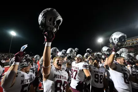 Erik Barker #88 of the Montana Grizzlies celebrates after beating the Eastern Washington Eagles at Washington-Grizzly Stadium on September 14, 2024 in Missoula, Montana.