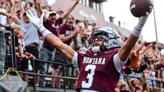 MISSOULA, MONTANA - SEPTEMBER 13: Wide receiver Brooks Davis #3 of the Montana Grizzlies celebrates after catching the game-winning touchdown against the North Dakota Fighting Hawks at Washington-Grizzly Stadium on September 13, 2025, in Missoula, Montana.