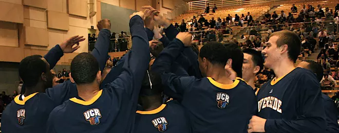 Men's Basketball Team Huddle