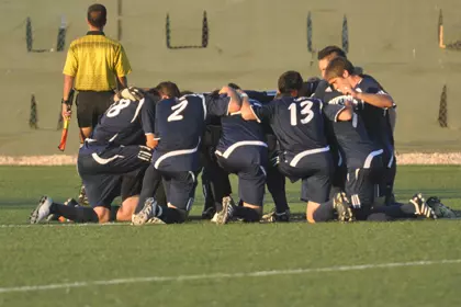 Tam Kneeling Prior To Half