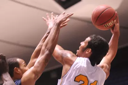 Early Second-Half Run Gives Titans 72-61 Win Over Men's Basketball Image