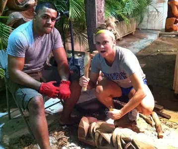 Shelley Brumbaugh carving a Tiki statue