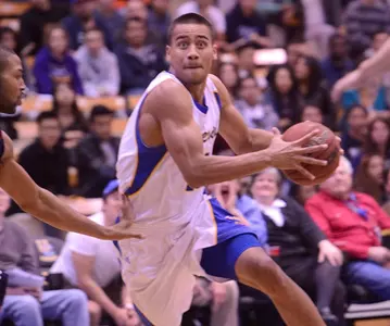 Men's Basketball Battles Back, But Titans' Buzzer Beater Ends Comeback Bid, 71-69. Image