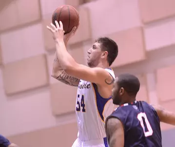 Men's Basketball Scores Five Points Over Final 33.2 Seconds For 65-64 Win Over CSUN Image