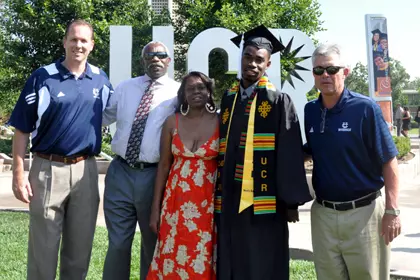Coach Cutts, Kareem Nitoto, Coach Wooldridge, graduation