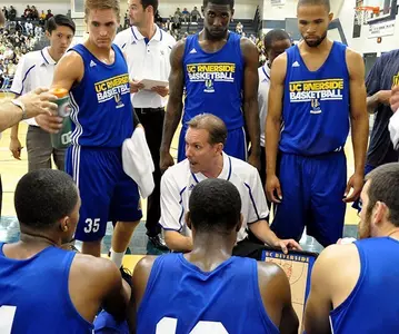 Dennis Cutts Talking With Team During Time Out