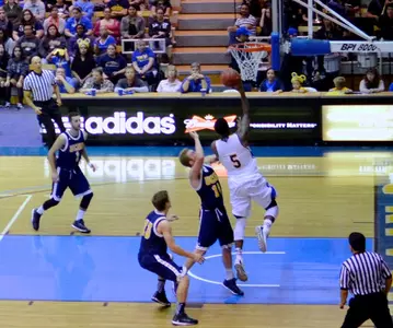 Johns' 28 Points & 17 Rebounds Give Men's Basketball 78-67 Win Over Houston Baptist Image