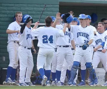 Drake Zarate high fives in dugout