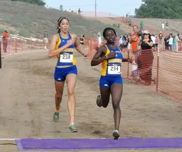 Weslie Totten and Faith Makau Crossing Finish Line