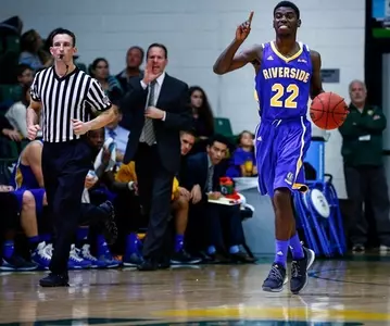 Malik Thames dribbling