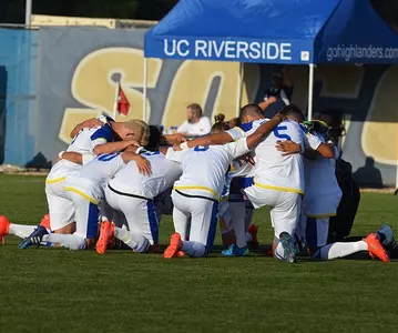 Men's Soccer Team pregame huddle