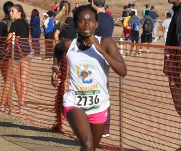 Faith Makau Crossing Finish Line