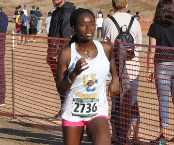 Faith Makau Crossing FInish Line