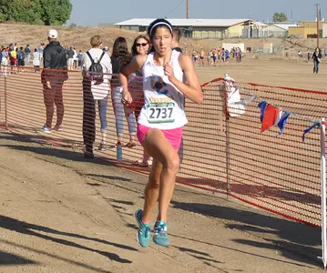Weslie Pearce Crossing Finish Line