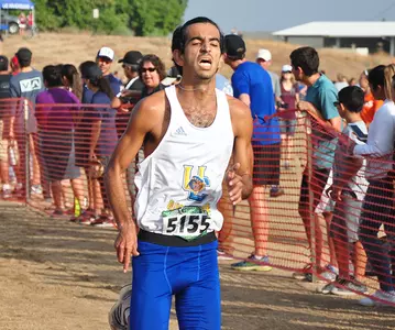 Arman Irani Crossing Finish Line