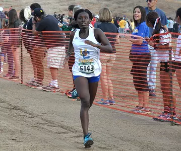 Faith Makau Crossing Finish Line