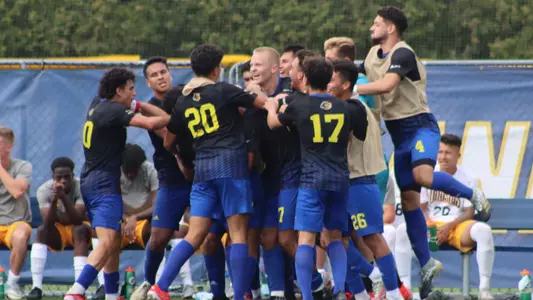 Team celebration at Canisius