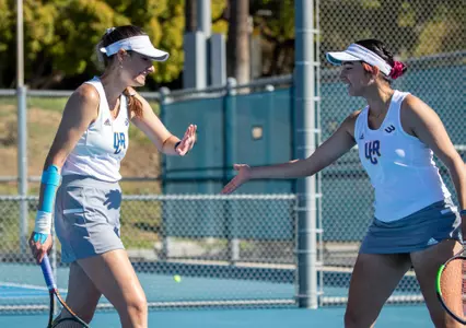 Members of UCRÕs womenÕs tennis team during their match against Long Beach State on February 18, 2022, at UC Riverside.
(UCR/Stan Lim)