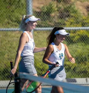 UCRÕs womenÕs tennis team member Serina Saltzen, left, and Sydney Tran during their match against Long Beach State on February 18, 2022, at UC Riverside.
(UCR/Stan Lim)