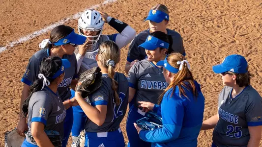 Softball team huddle